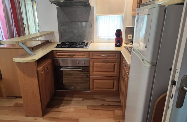 Mobile home 2 bedrooms, tv, air conditioning, covered terrace 4 persons