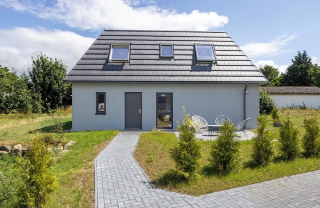 Modern holiday home with a terrace and a garden
