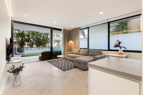 Modern 1BR Abode with Courtyard Steps to the Beach