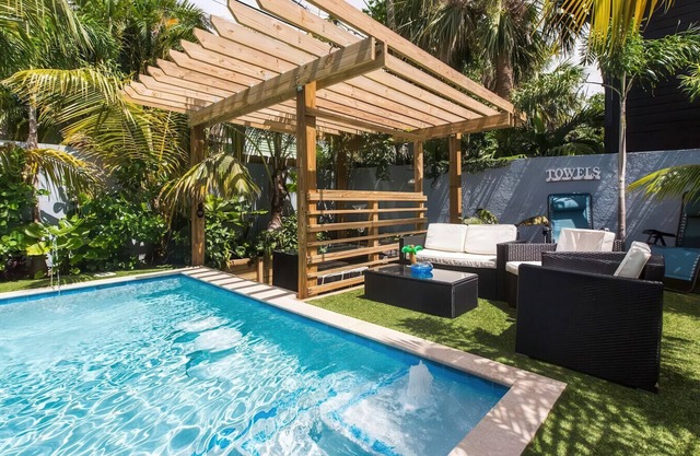 Modern 2BR Oasis Heated Pool Near Downtown