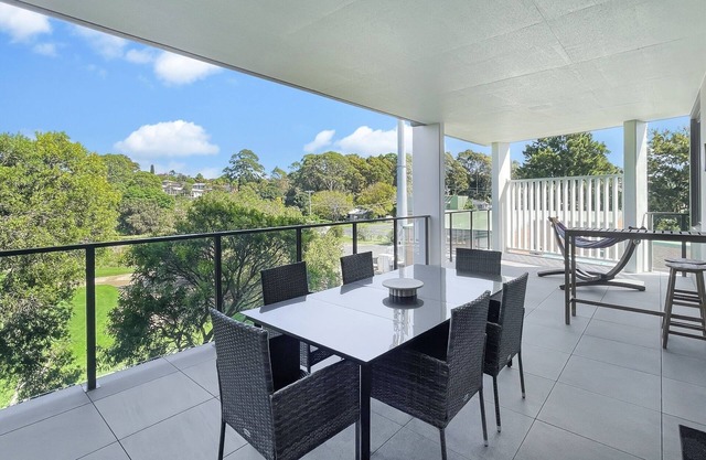 Modern 3-Bedroom Golfside Apartment with Balcony