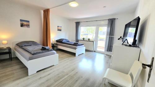 Modern 3-Room Apartment with Balcony & Free Parking & Free Wi-Fi in Hagen - HL01