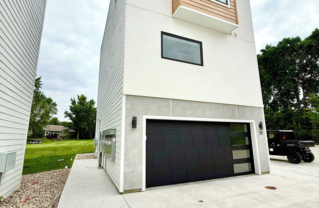 Modern 3-Story Condo Across from Arnold’s Park – Walk to Fun, Lake, & Dining!