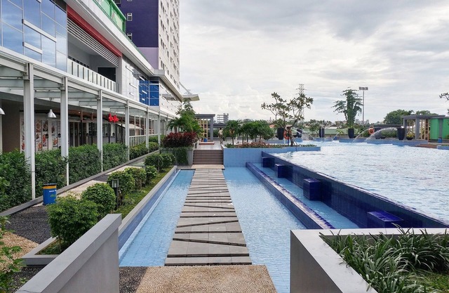 Modern and Bright 2BR Green Pramuka Apartment