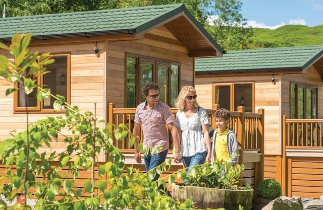 Modern and contemporary lodge style holiday home set in woodland area.