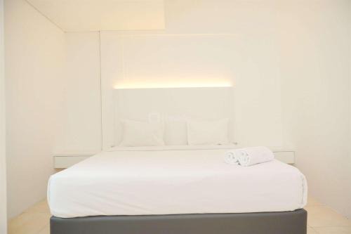 Modern and Homey 2BR at MT Haryono Square Apartment By Travelio