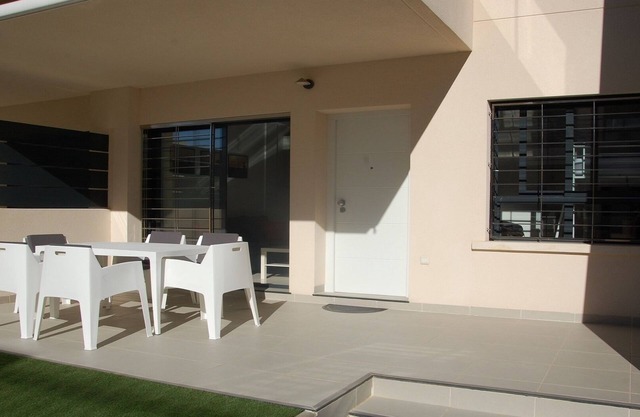 Modern apartment 250 m from the sea with south facing terrace and swimming pool