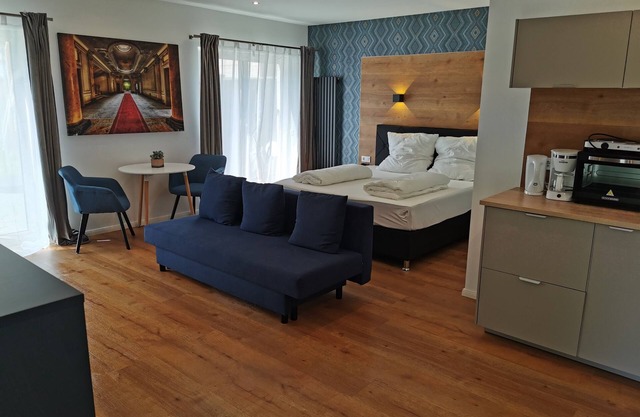 Modern apartment, private terrace, quiet location in the historic backyard