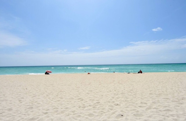 Modern Beachfront Studio w/Beach Essentials. Just steps from the beach!