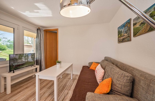Modern bungalow in Lütow on the Achterwasser with terrace and jetty access
