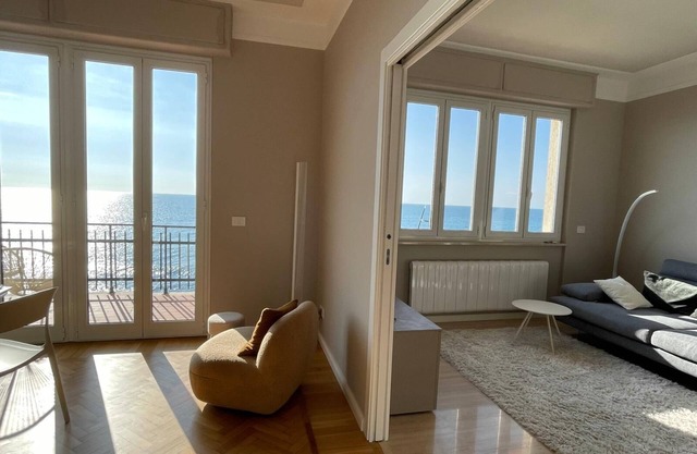 Modern design apartment directly on the beach with frontal sea view and dream ba