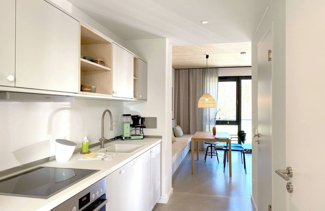 Modern duplex apartment with rooftop terrace.