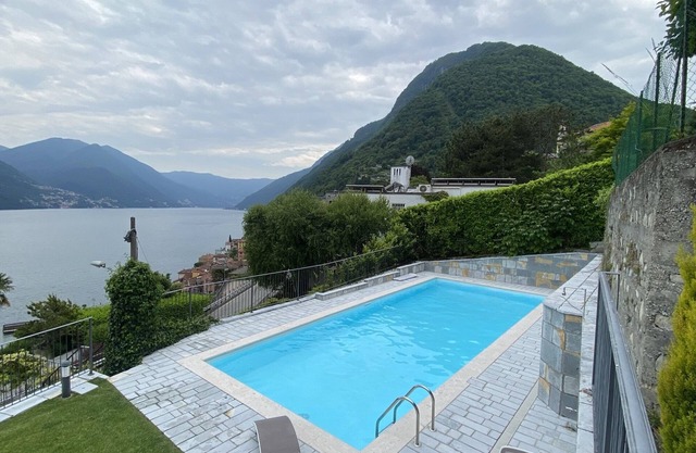 Modern duplex apartment with magic views and pool over the lake.