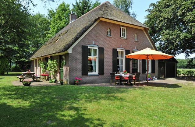 Modern farmhouse in Emst with a beautiful terrace and garden