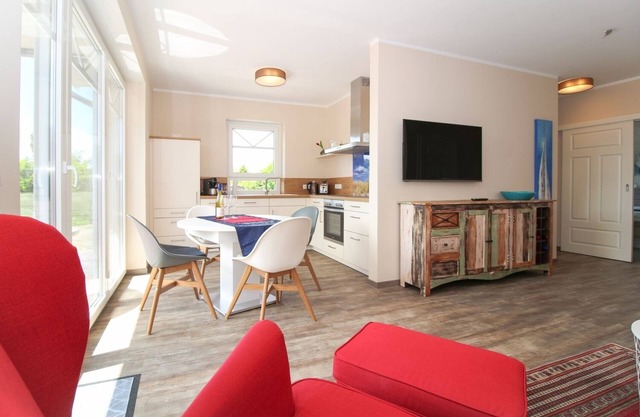 Modern first floor apartment with sauna and beach chair in the garden for 4 persons