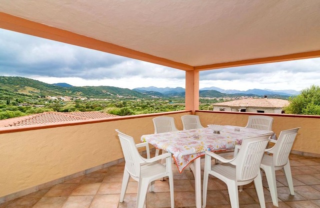 Modern Holiday Apartment “Appartamento Teseo” with Mountain View, Wi-Fi, Air Conditioning, Garden, Terrace & Balcony; Parking Available