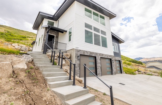 Modern home at foot of mountain