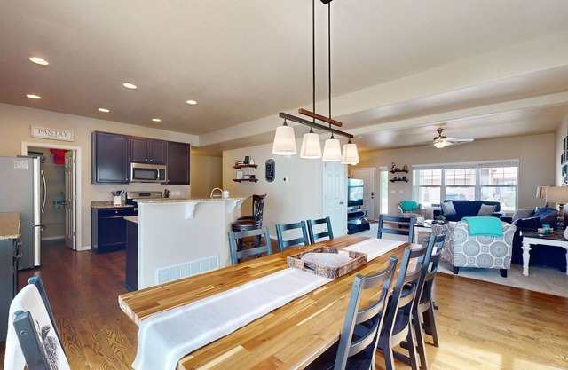 Modern home with fenced yard, firepit, foosball & WFH desks