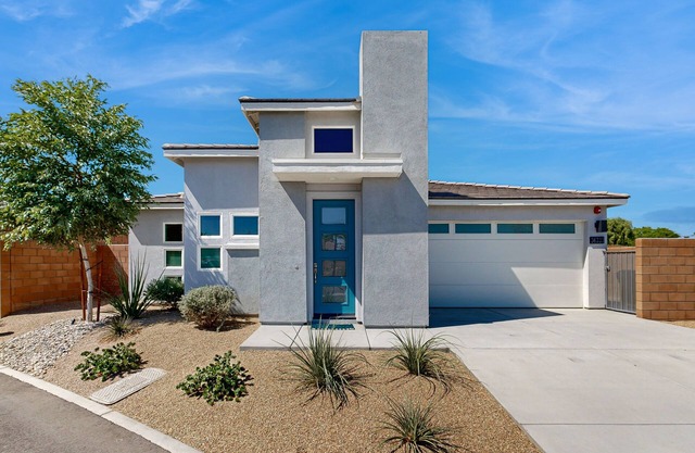 Modern home with gas fireplace, mountain views, large yard