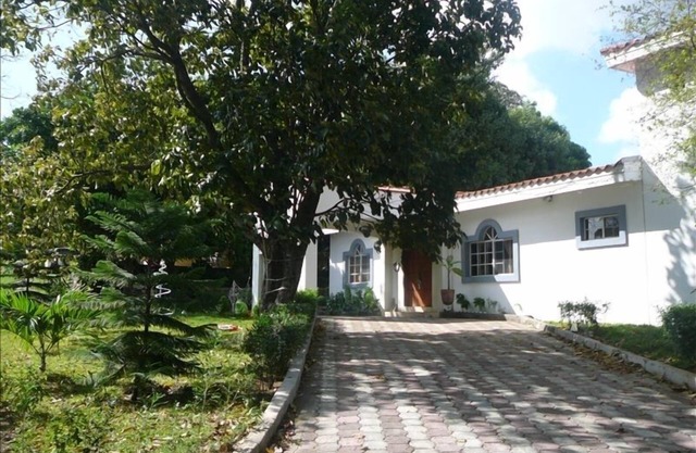 Modern House in Managua Suburbs, Within a Lush Garden Setting.