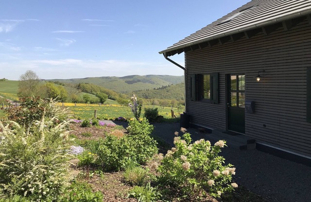 Modern House-new building with a distant view in the National Park, the "Eifelsteig"