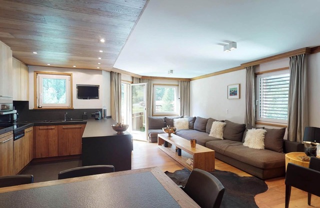 Modern in alpine style designed apartment with tasteful details
