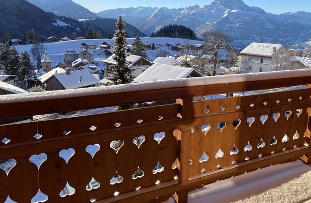 Modern large luxury apartment with stunning views in village centre