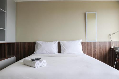 Modern Look and Homey Studio Apartment Gateway Park LRT City Jatibening By Travelio