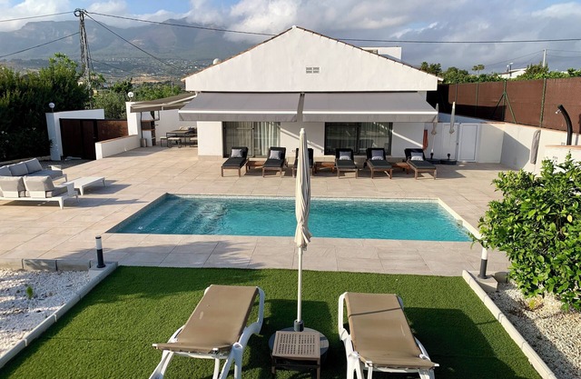 Modern luxury villa w/stunning views, private heated pool + roof terrace
