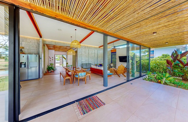 Modern masterpiece with high-end appliances, water views, and outdoor living