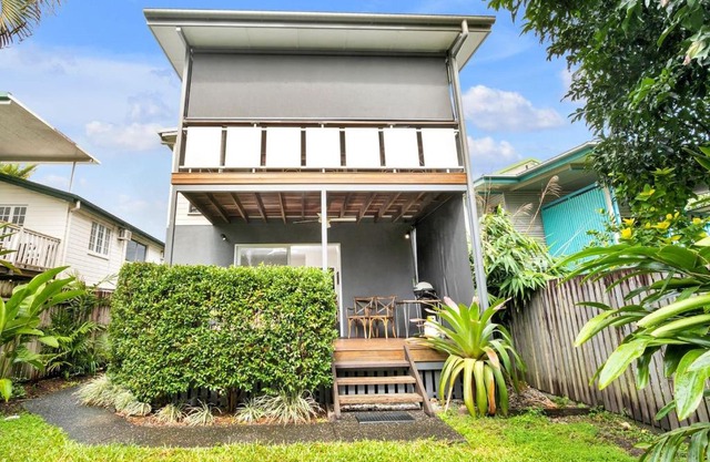 Modern meets Tropical in this Free-standing Home