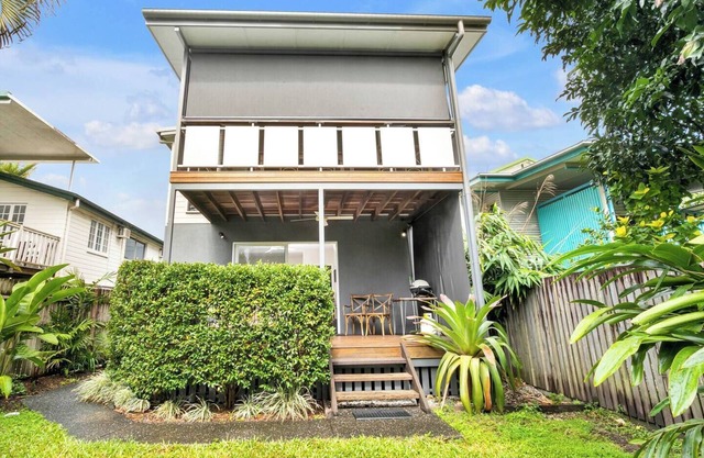 Modern meets Tropical in this Free standing Home