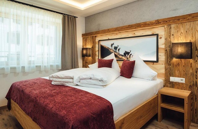 Modern meets Tyrol - bright apartment in the apart-hotel with high-quality equipment