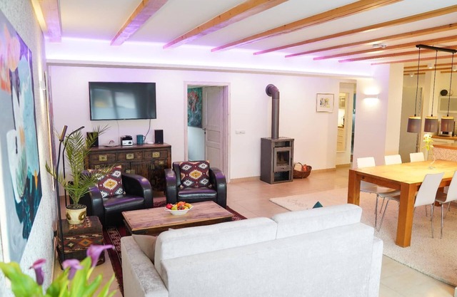 Modern, open-plan loft with south-facing balcony