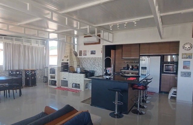 Modern penthouse with gourmet kitchen 300 meters from the beach
