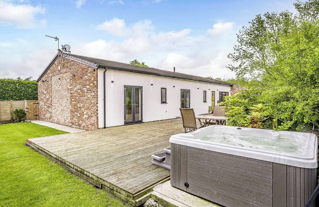 Modern spacious barn conversion with stylish finish.