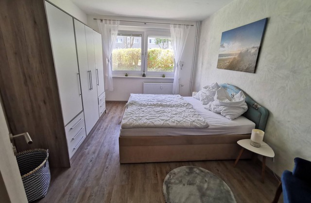 Modern vacation apartment with lake view and balcony on the ground floor