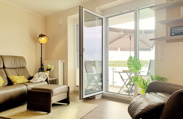 Modern vacation apartment directly on the North Sea dike