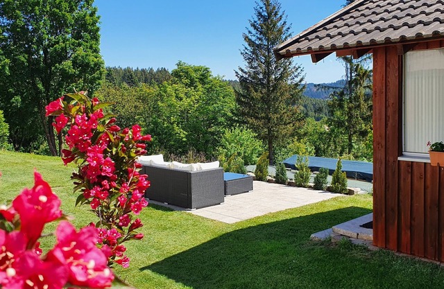 Modern vacation apartment with private garden and fantastic view