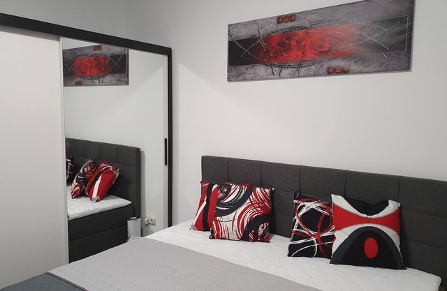 Modern vacation apartment with balcony directly on the Peene