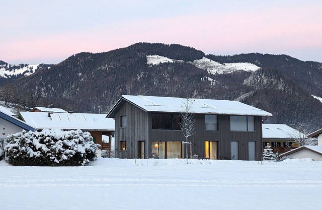 Modern vacation home with all-round mountain views, pool, sauna and large garden