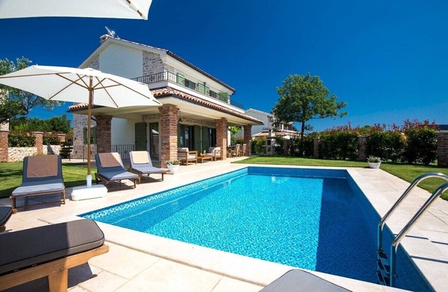 Modern Villa Nika* with a rustic touch and a pool on Krk