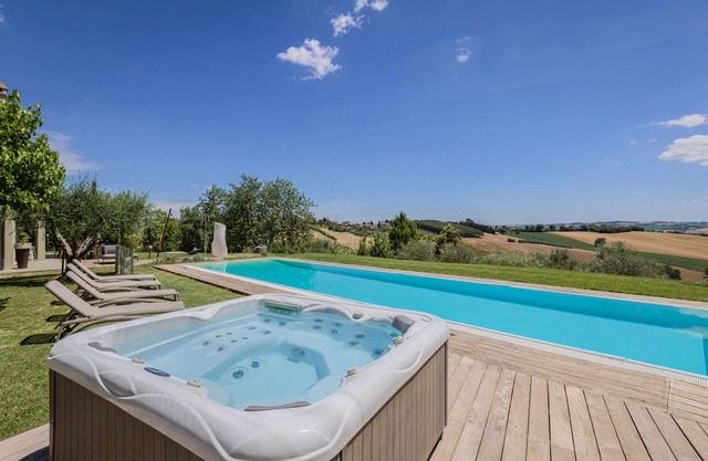Modern villa with heated pool and Jacuzzi, near Ripe, just 20 minutes from the beach of Senigallia