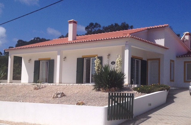 Modern villa with private pool and stunning views down to Monte Clerigo beach