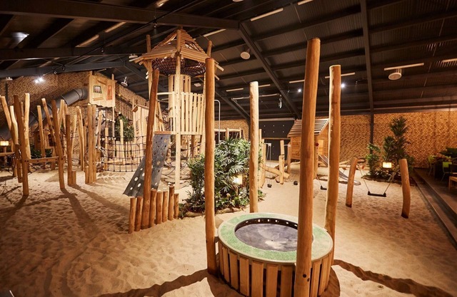Modern villa with themed children's room in a holiday park in Limburg