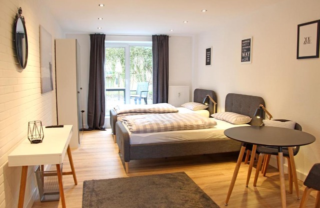 Moderne 1-Zimmer Wohnung mit Terasse, Küche, Bad mit Dusche, TV & WIFI
