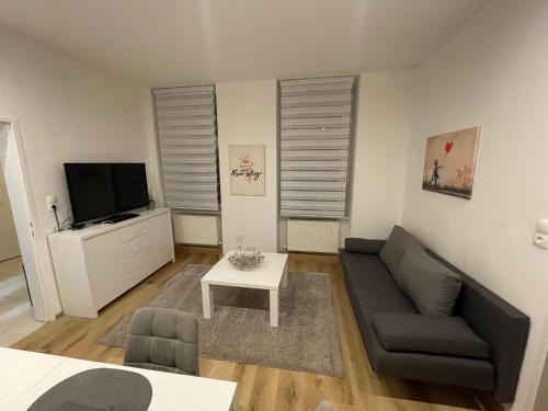 Modernes 60m2 Erdgeschoss Apartment mit Gartenblick - Hundefreundlich nähe Westbahnhof T5