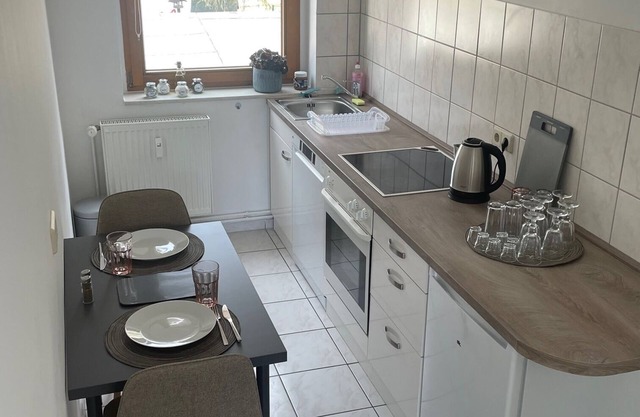 Modernly furnished apartment, quiet downtown location, parking space + dishwasher