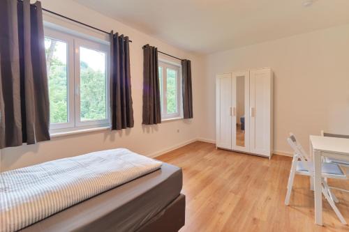 Monteurwohnungen in Trier - Parkplatz - Einzelbetten - Waschmaschine und Trockner