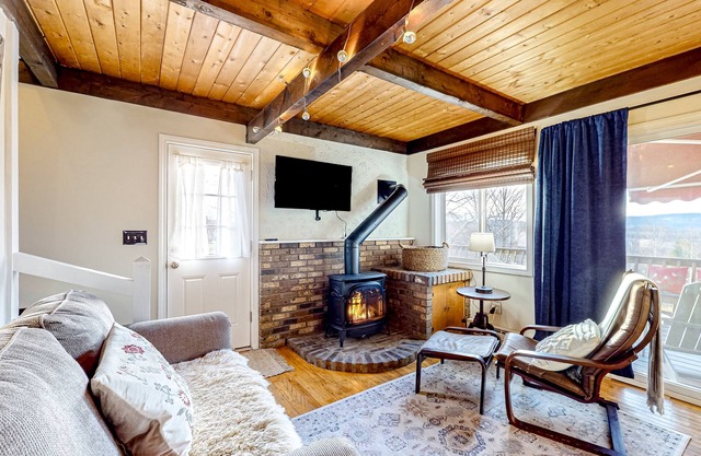 Mountain-view cottage with inviting deck, fireplace & washer/dryer